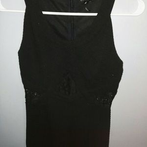 Black mini dress with 3 lace peep holes